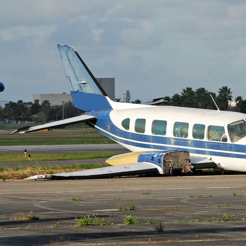 Crash landed propeller airplane